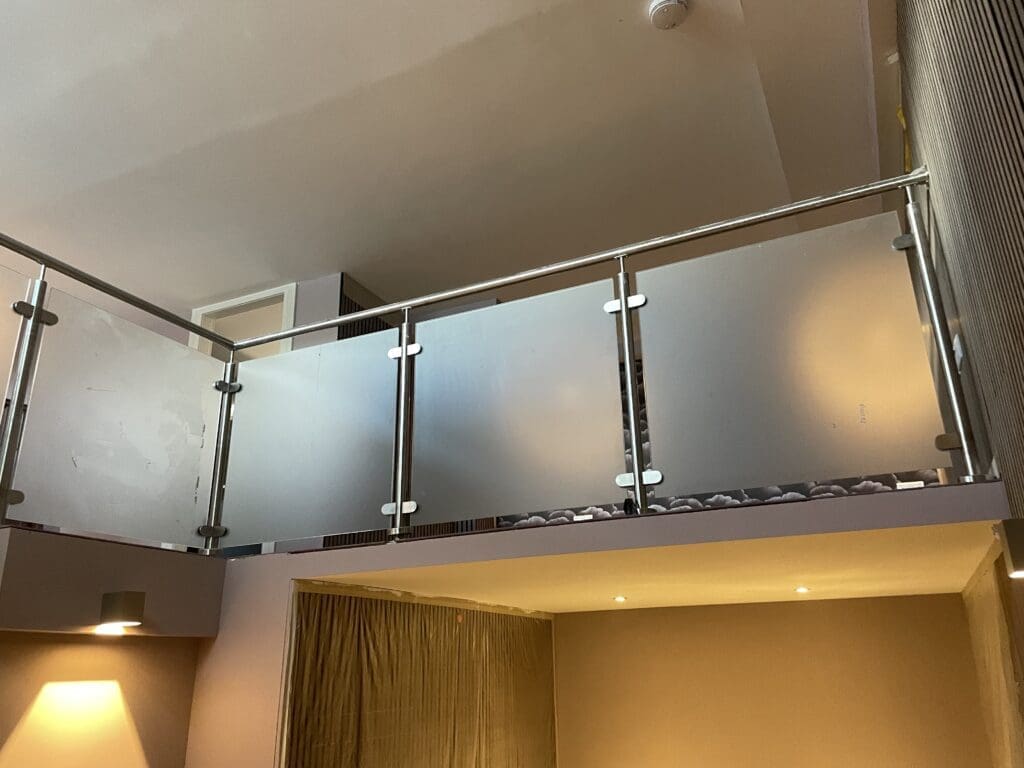 Glass Balustrade Essex 12 Internal glass balustrade with obscure glass panels