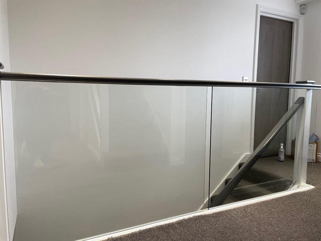 Homepage 2024 16 Staircase renovation in Chelmsford, Essex. Stripped out all the old timber and replaces with brand new slotted timber handrails and 10mm clear glass
