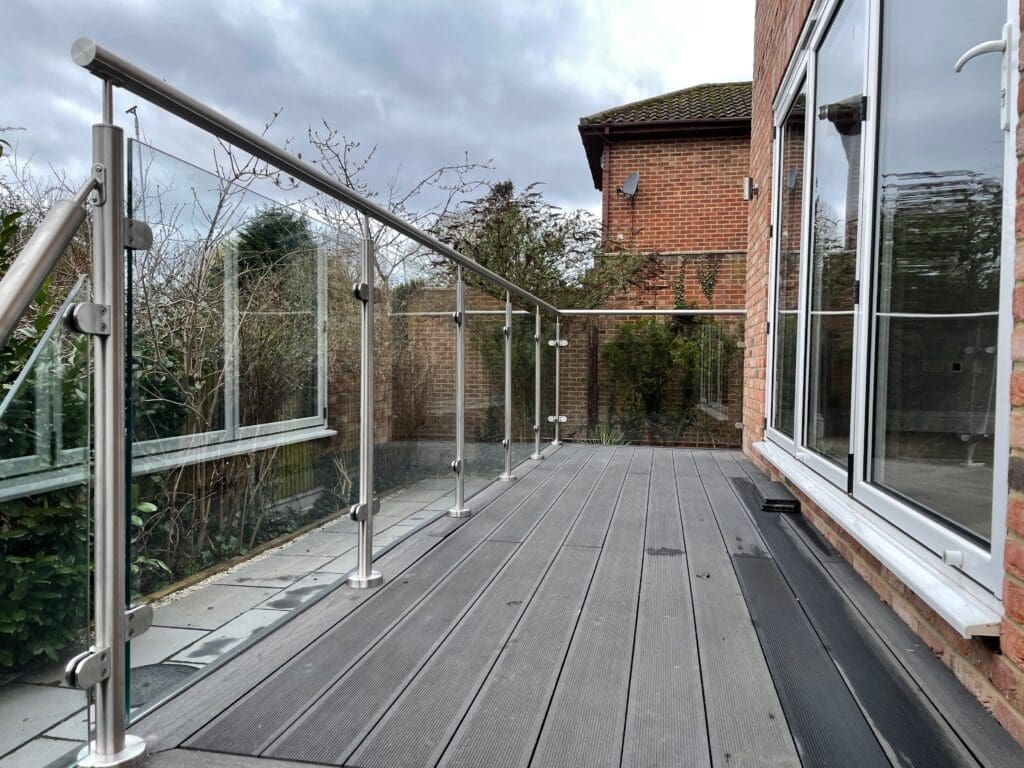 Glass balustrade post and rail system with 10mm clear toughened glass