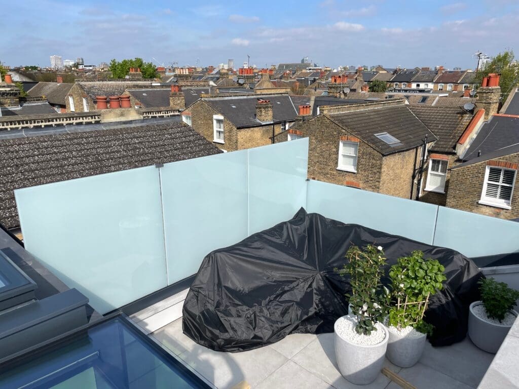 Frameless Glass Balustrade London And Essex 6 Rooftop opaque glass balustrade supplied and installed for a customer In Clapham, South London