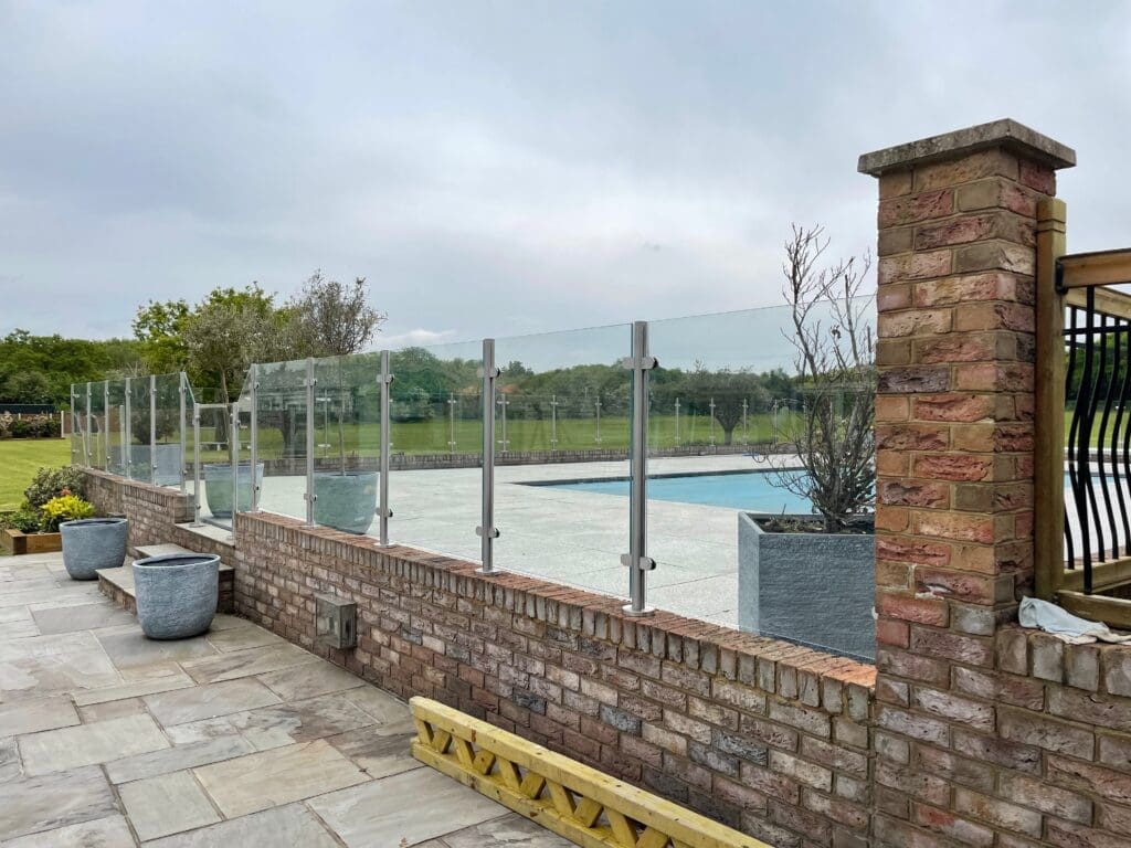 Glass Balustrade Essex 15 Stylish free floating glass balustrade, which not only looks great. It also gives you complete safety around your swimming pool