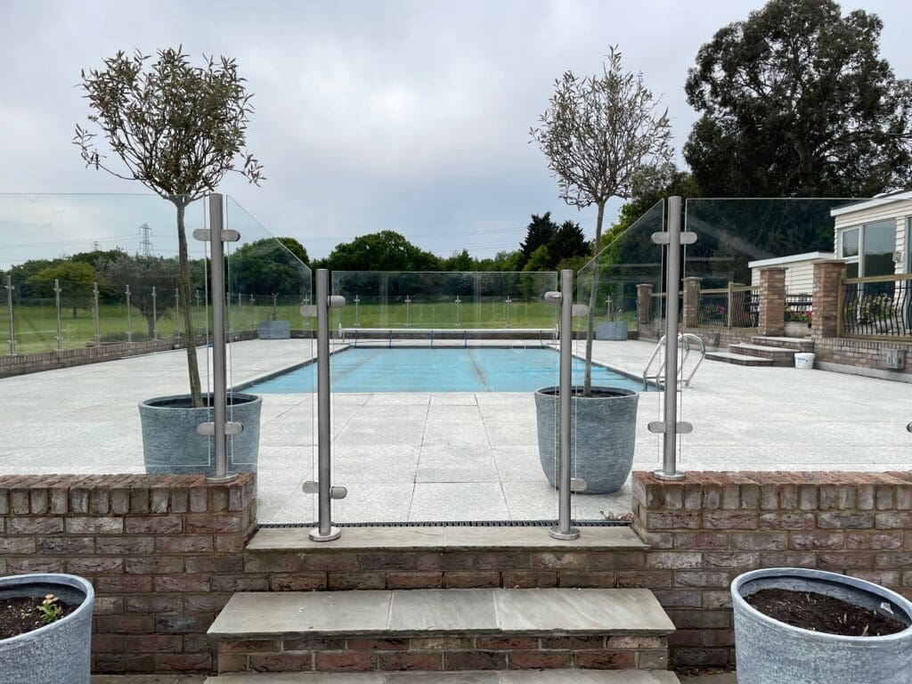 Stylish free floating glass balustrade, which not only looks great. It also gives you complete safety around your swimming pool