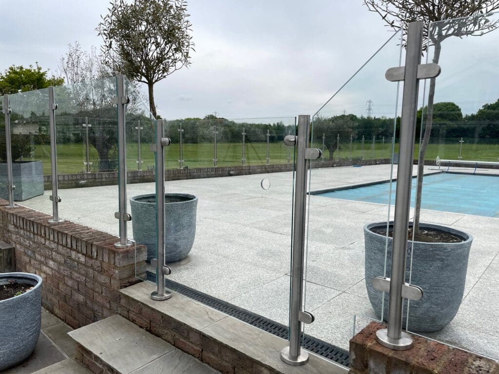 Stylish free floating glass balustrade, which not only looks great. It also gives you complete safety around your swimming pool