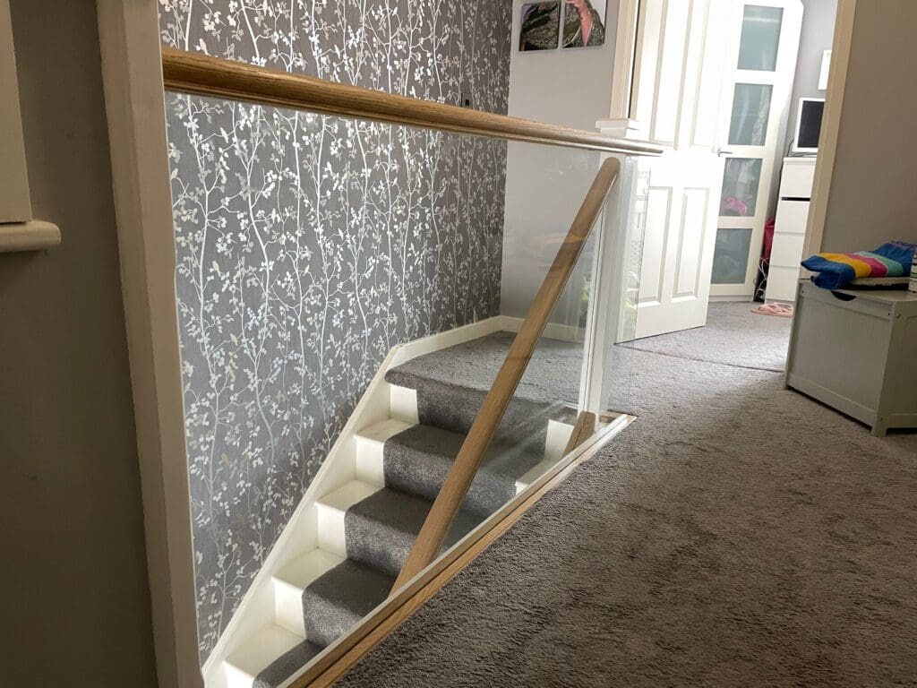 Glass Staircases 1 10mm clear toughened glass panel staircase with oak slotted handrail and base rail