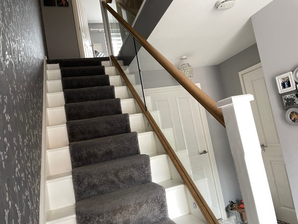 Glass Staircases 2 10mm clear toughened glass panel staircase with oak slotted handrail and base rail