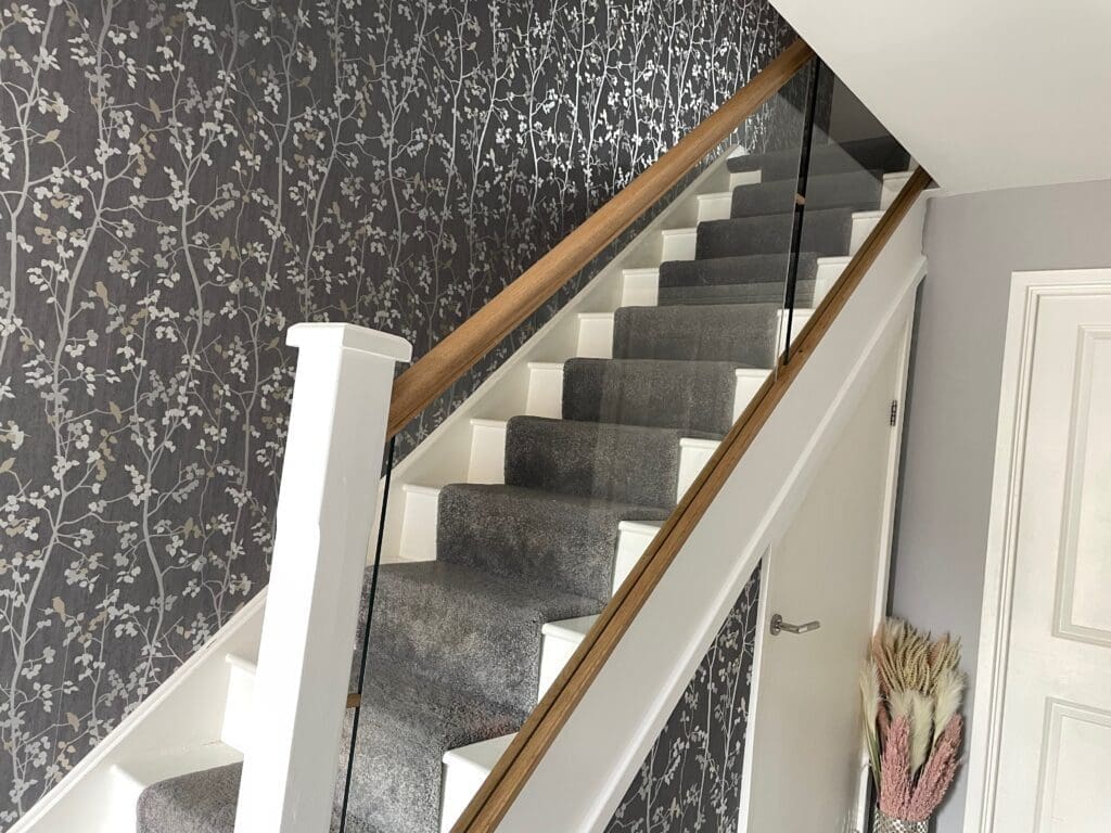 Homepage 2024 17 10mm clear toughened glass panel staircase with oak slotted handrail and base rail