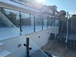 Black powder coated patio glass balustrade - Chigwell, Essex